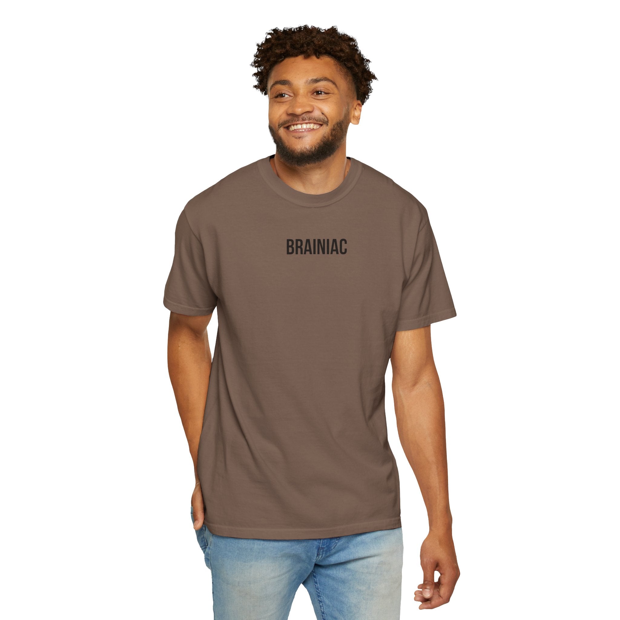 Man smiling wearing a brown t-shirt with 'BRAINIAC' text on a white background