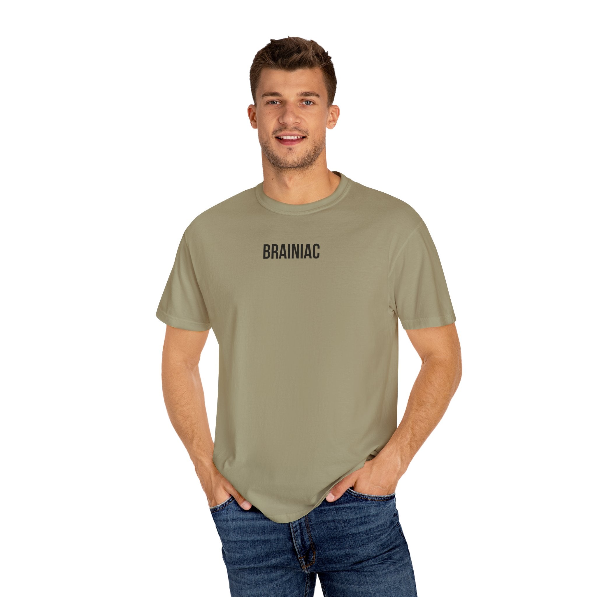 Man smiling wearing a khaki t-shirt with 'BRAINIAC' text on a white background