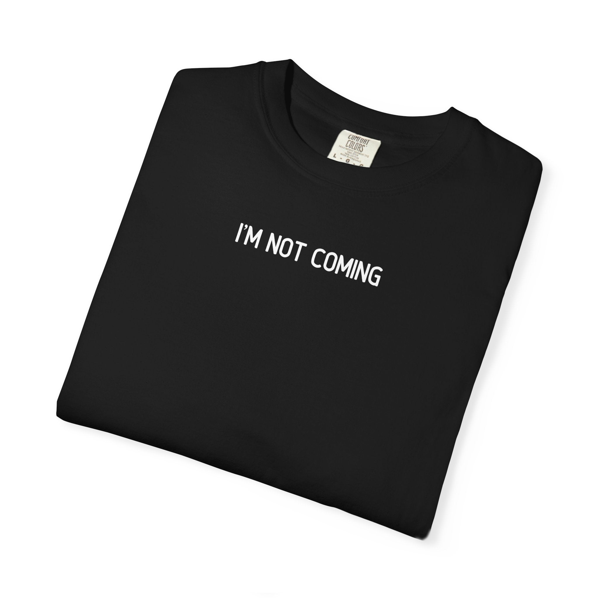 Black t-shirt with 'I'M NOT COMING' text on a white background